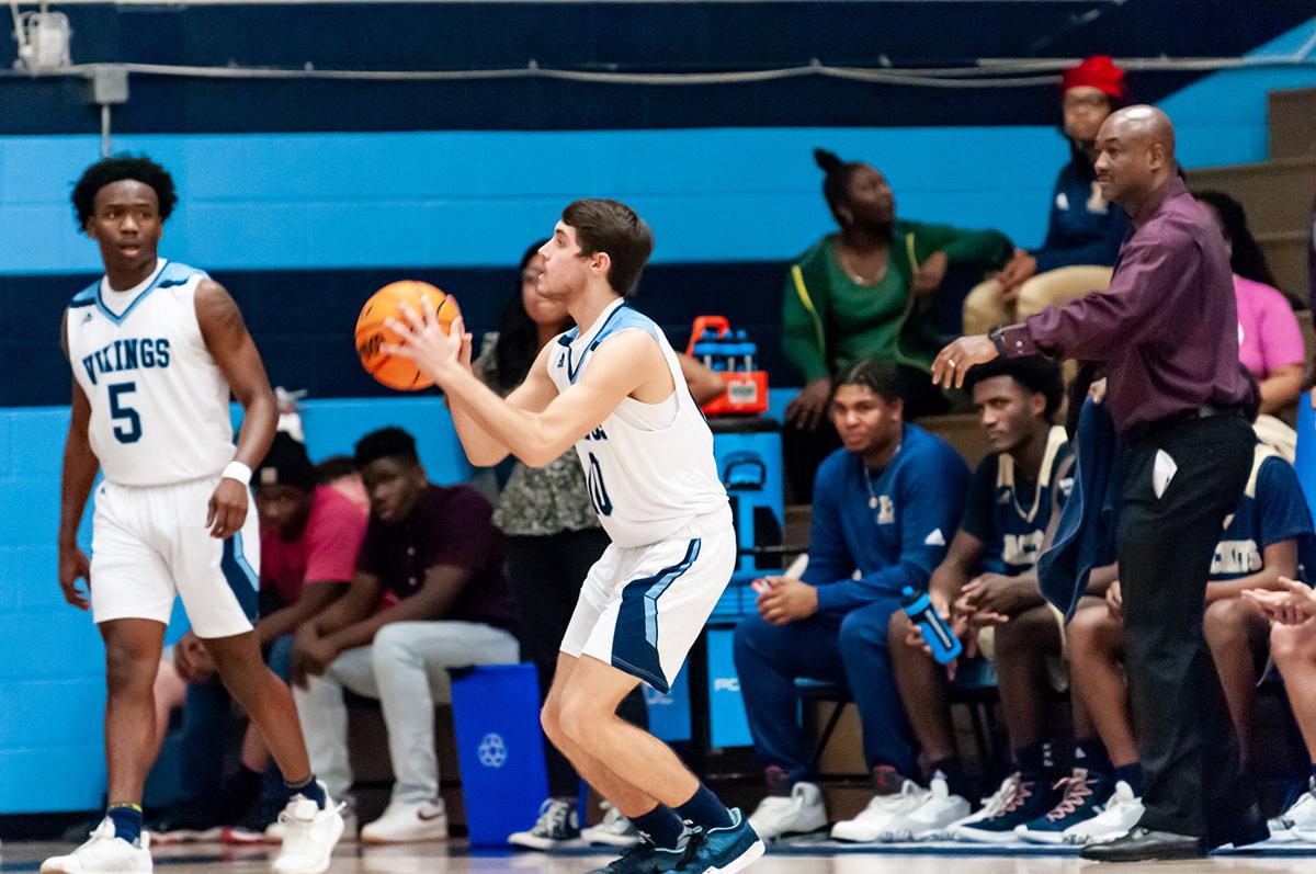 Union Pines men defeat Lee County 49-47