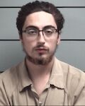 Plymouth man held for Chicago Police warrant