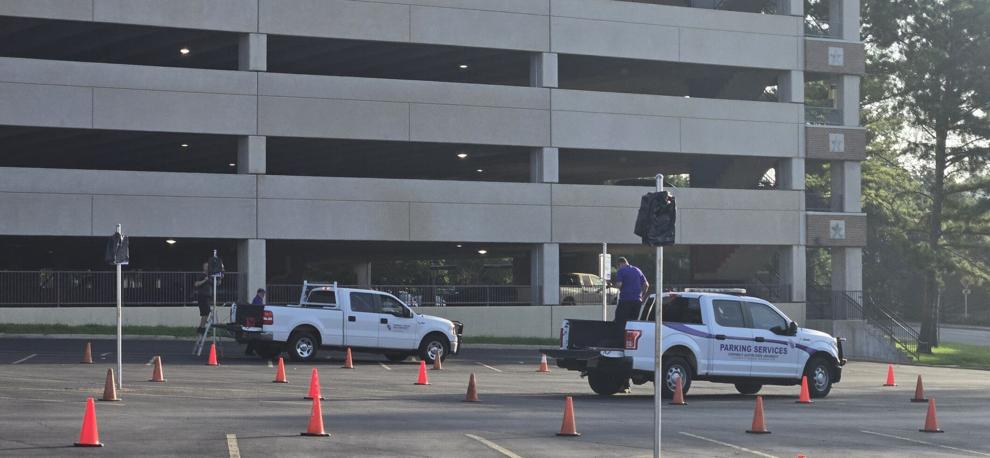 Lot 14 converted to paid parking, eliminates all permit lot