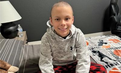 Boy braves battle with childhood cancer