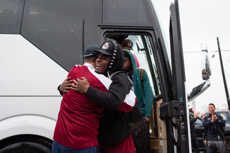 Liberty state champions arrive home