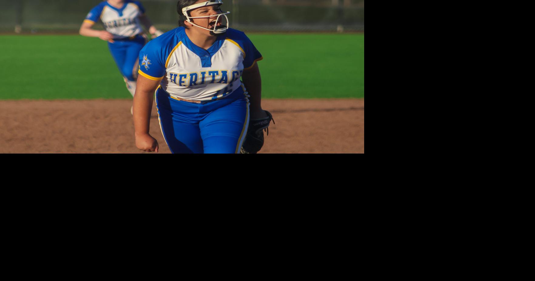 Heritage softball gets much-needed first win in a wild finish in extras ...