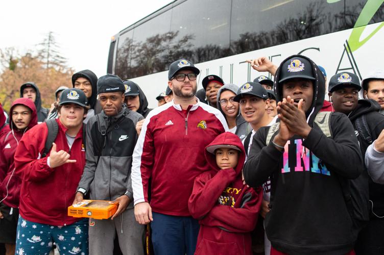Liberty state champions arrive home