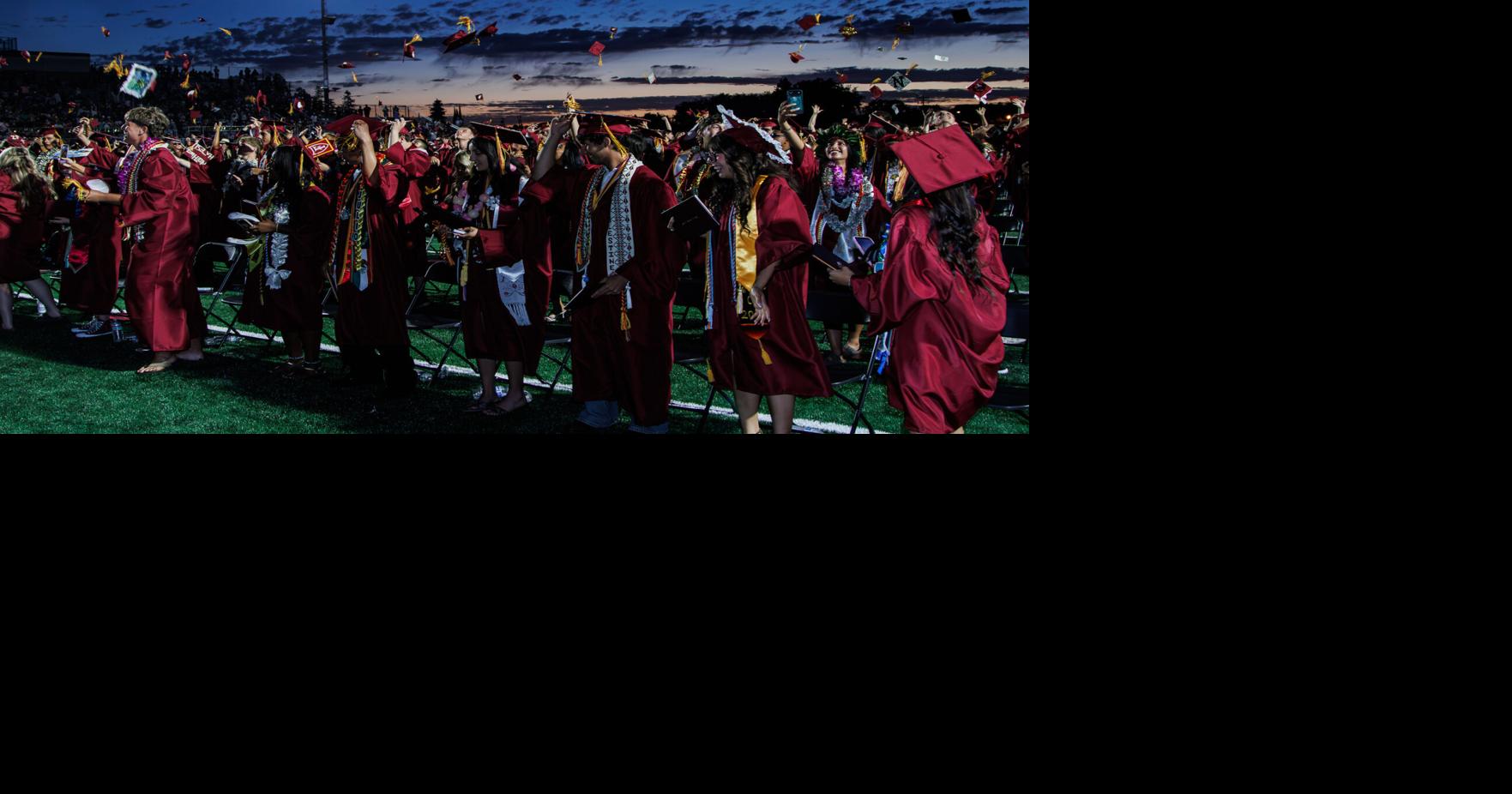 Liberty's seniors toss their caps and celebrate during their graduation ceremony