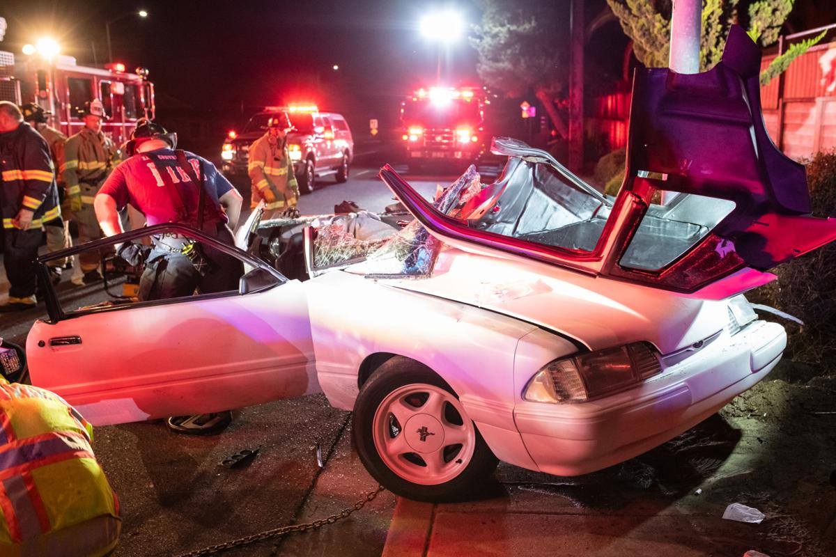 Car strikes light pole in Oakley