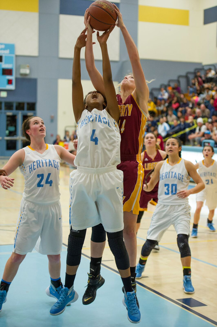 Heritage High School basketball teams defeat Liberty Lions in BVAL play