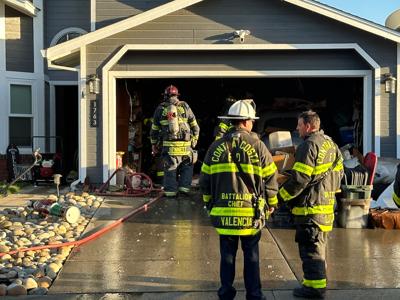 Family safe as electrical fire ravages garage