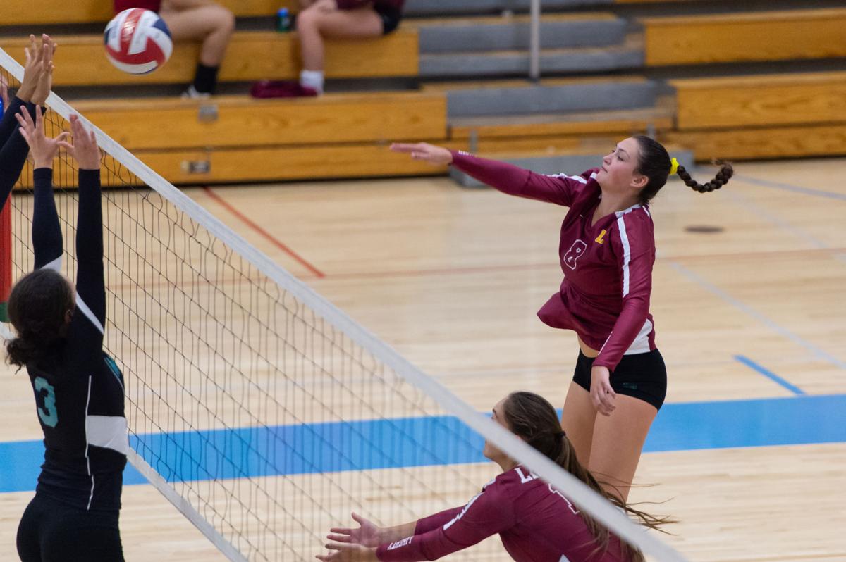 Liberty High School volleyball team shining on the court Sports