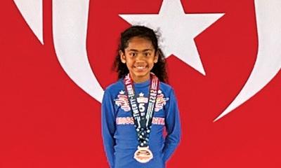 Brentwood runner medals at Junior Olympics