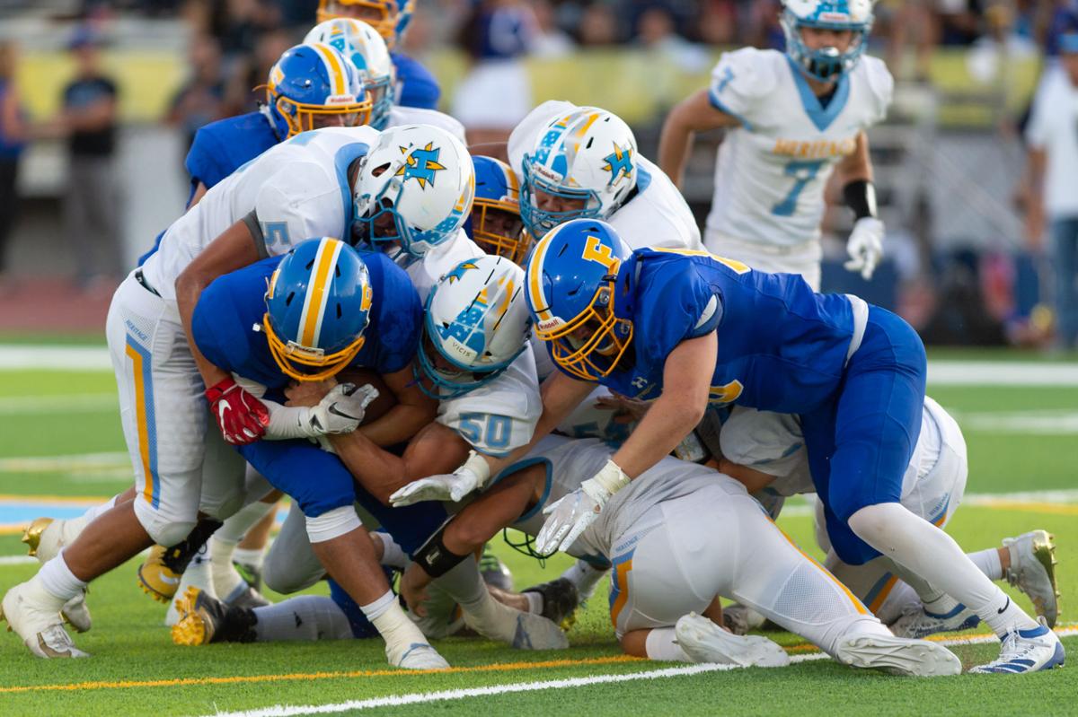 Foothill High football team runs over Heritage Sports
