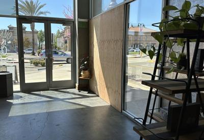 Driver of truck crashes into local coffee shop