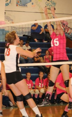 Lydia Curley spikes it over the net