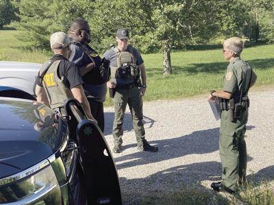 A team debriefing after compliance check with a Dent County sex offender
