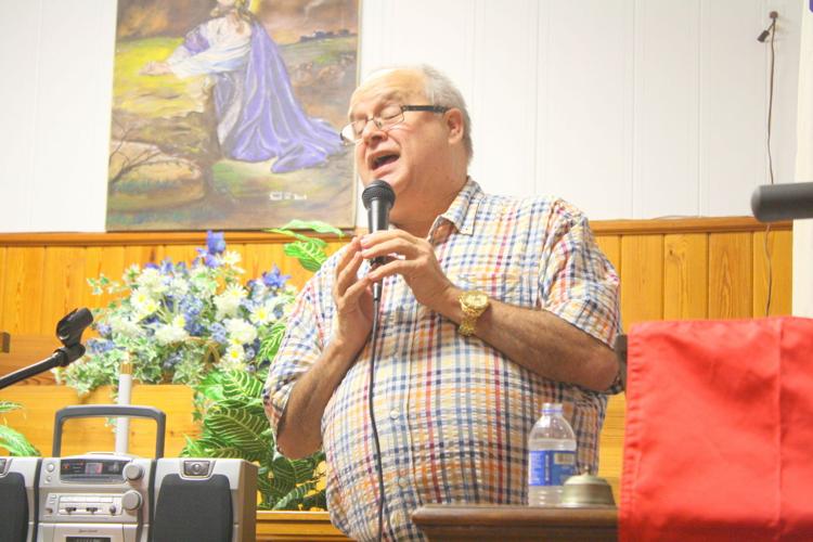 Dennis Skiles singing