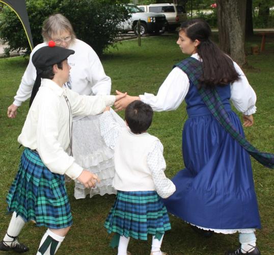 Members of the Adams family, Licking, demonstrated Scottish Country Dancing