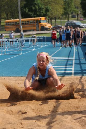 Savannah Hanning completing a long jump