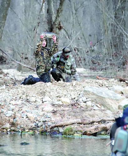 This fisherman held up his catch before heading to the lunker weigh-in.