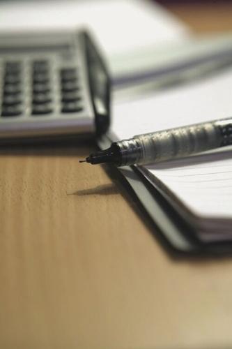 pen, pad and calculator