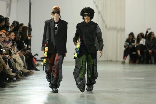 Models at Walter Van Beirendonck's show in a disused university building