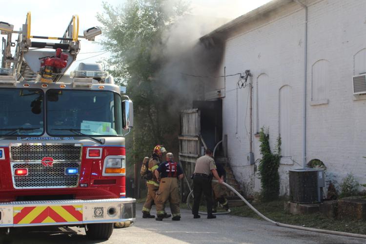 Firefighters beside the Country Corner Cafe