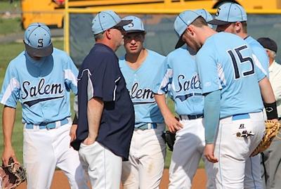 Coach Karr speaks to the team