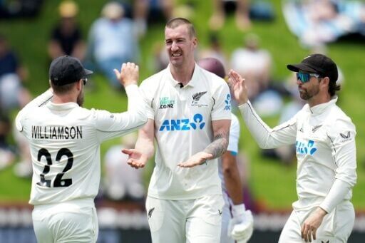 New Zealand's Blair Tickner (right) celebrates the wicket of West Indies' Brandon King
