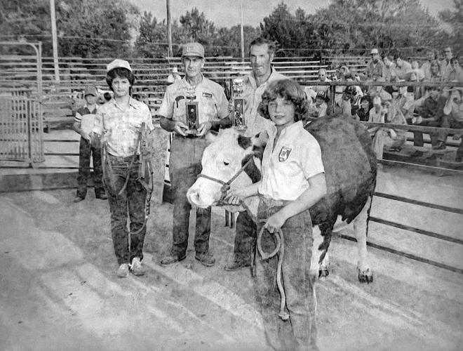 Mallery.Angie shows her steer at the fair.jpg