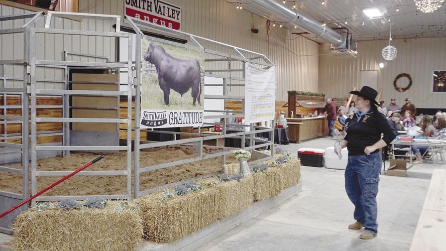 Tracy Strange, who organized the event, moments before the auction begins.