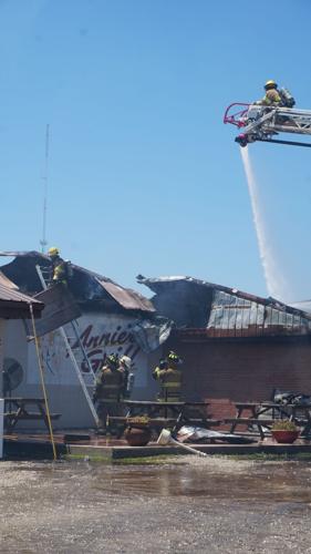Fire between the metal roof and ceiling at Annie's Grill