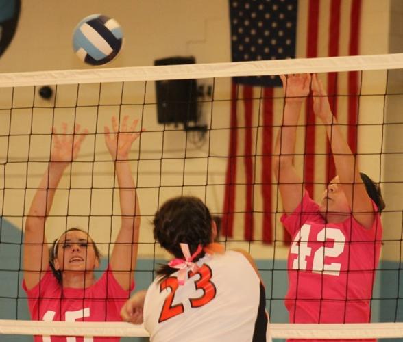Crocker, Parker attempt to block a spike