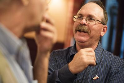 Barnitz in Cuba, talking with the country's agricultural leaders