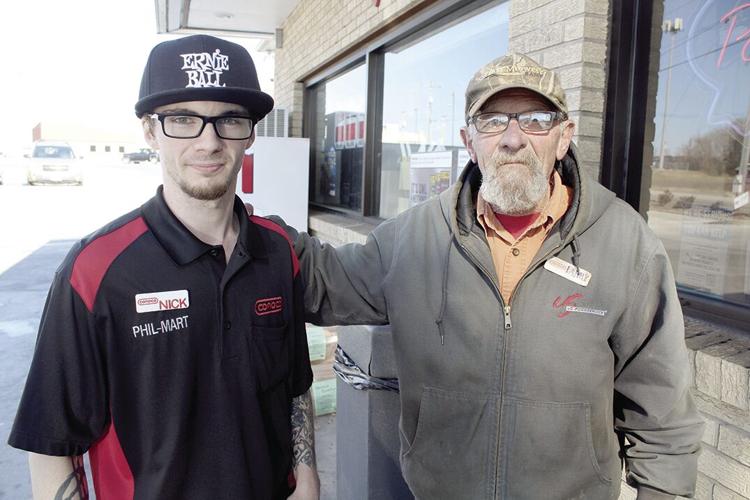 Nick Hopkins (left) standing alongside Larry Hopkins