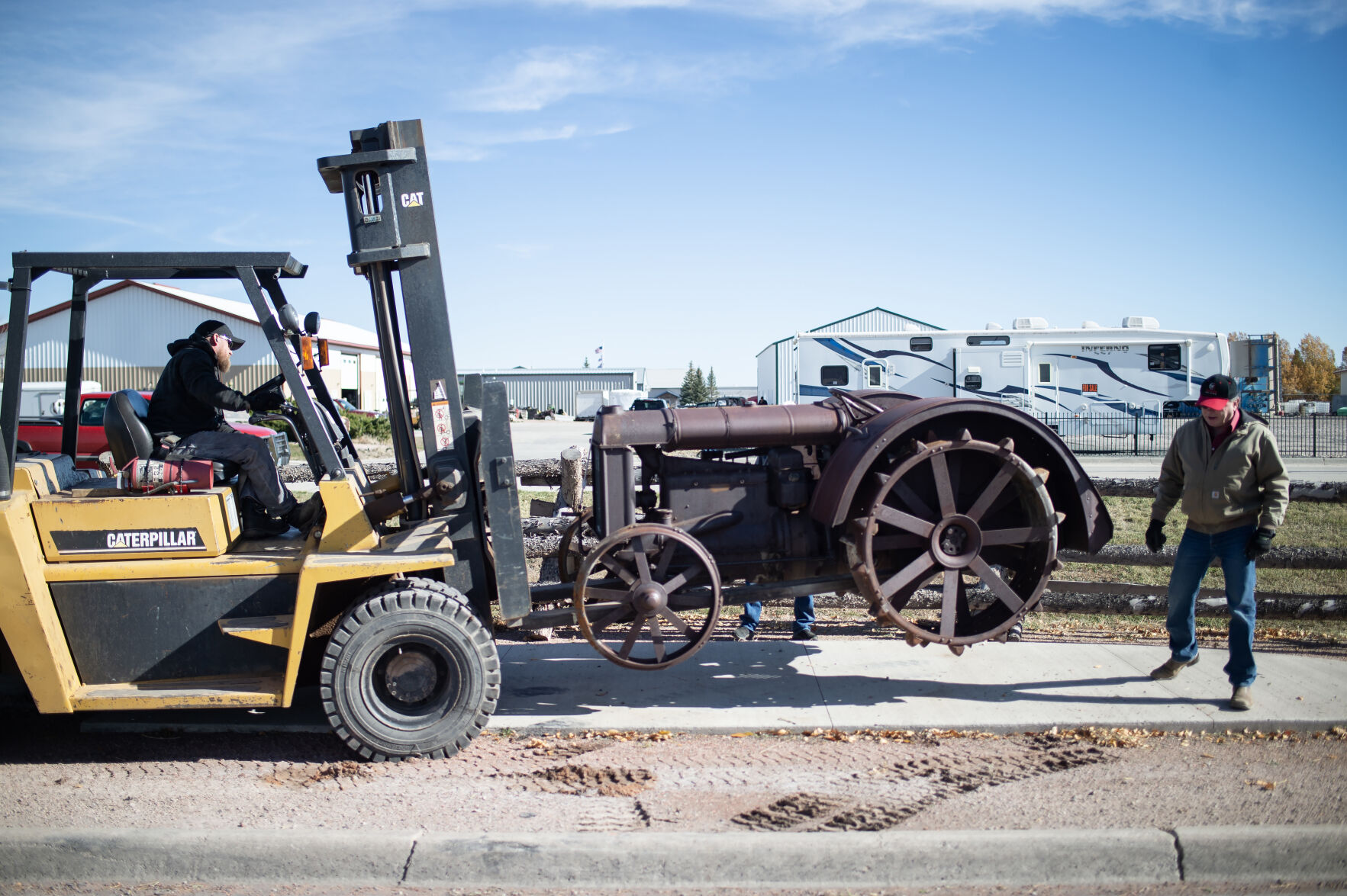 The return of “Big Red” Tractor installed along Gurley Avenue in