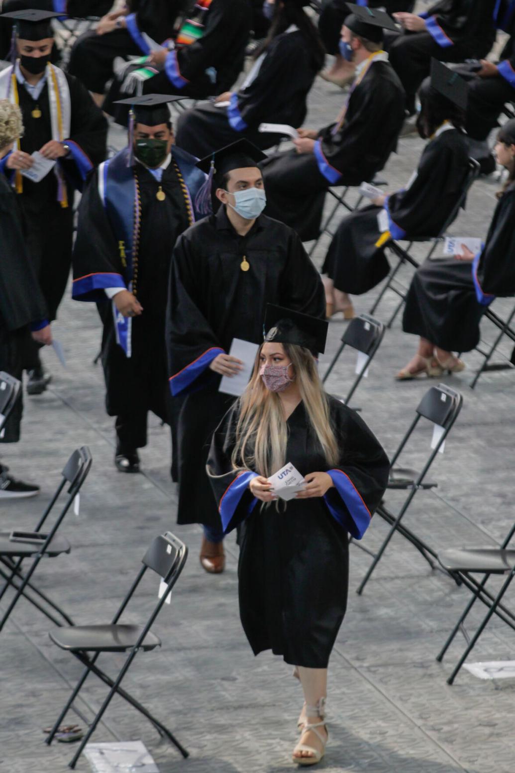 Photos UTA graduates walk the stage during first inperson
