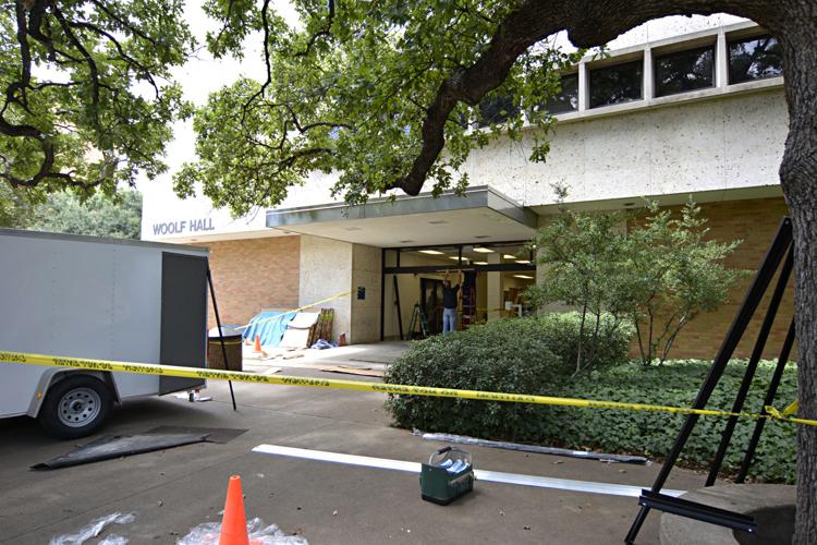 Crew installs new automated door in Woolf Hall Multimedia