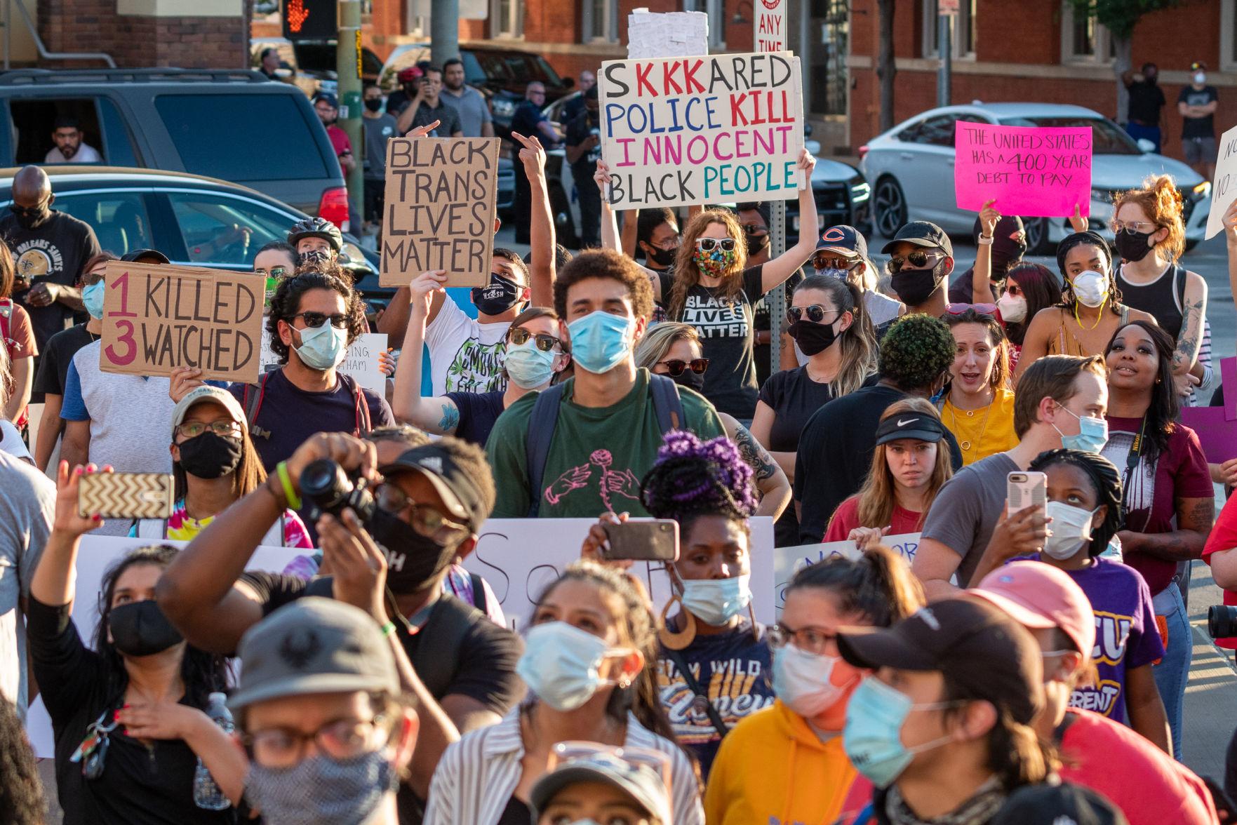 Demonstrators rally in downtown Dallas to protest police brutality