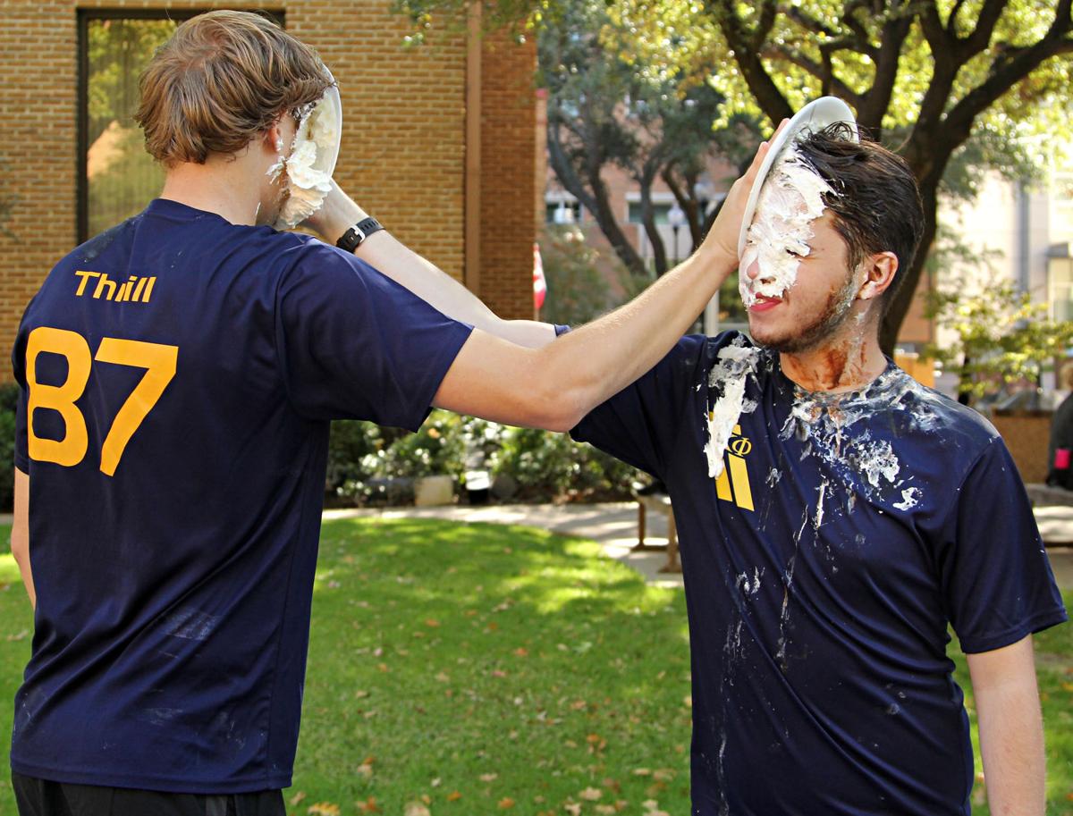 Fraternities raise money for organizations with pies, dunk tank