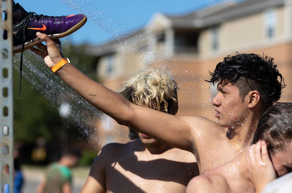 Photos: 31st annual UTA Oozeball tournament brings the fun in a mudslide