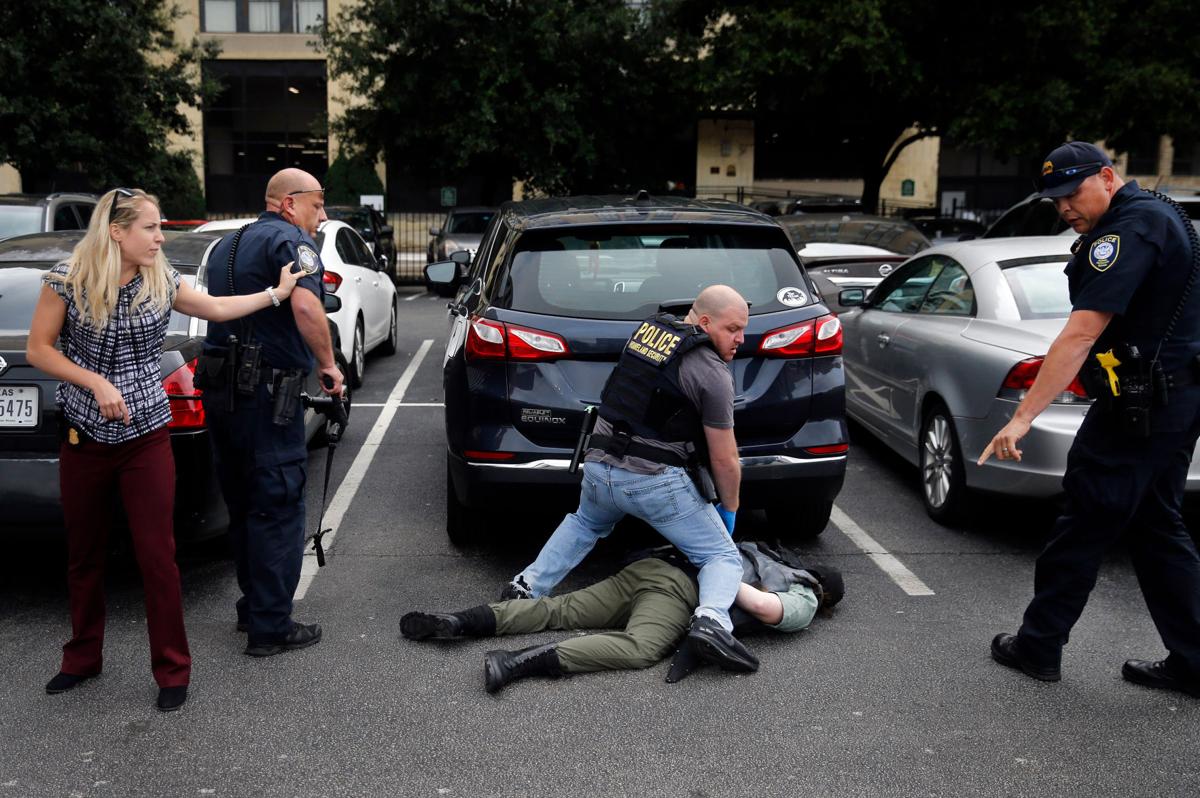 UTA alumnus caught in downtown Dallas shooting, photographs gunman