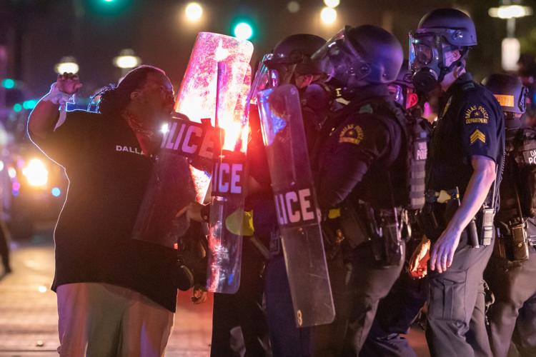 Photos: Protesters march in downtown Dallas demanding justice for black victims of police brutality