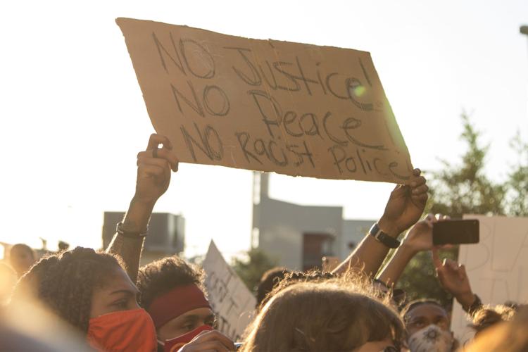 Photos: Protesters march in downtown Dallas demanding justice for black victims of police brutality