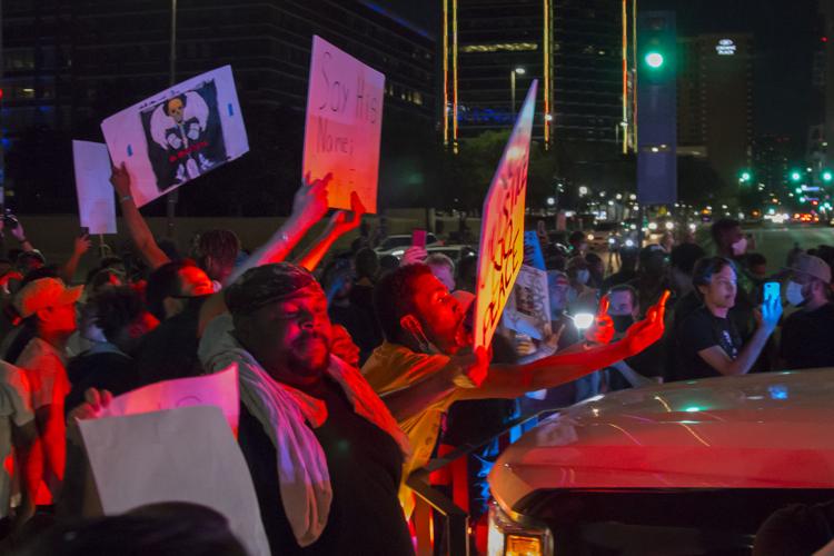 Photos: Protesters march in downtown Dallas demanding justice for black victims of police brutality