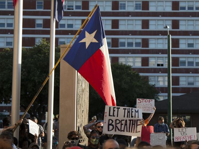 Photos: Protesters march in downtown Dallas demanding justice for black victims of police brutality
