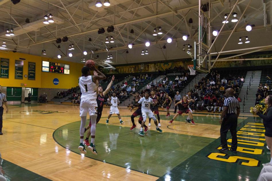 Basketball Men Fall To Northwood University Women Pull Away Late
