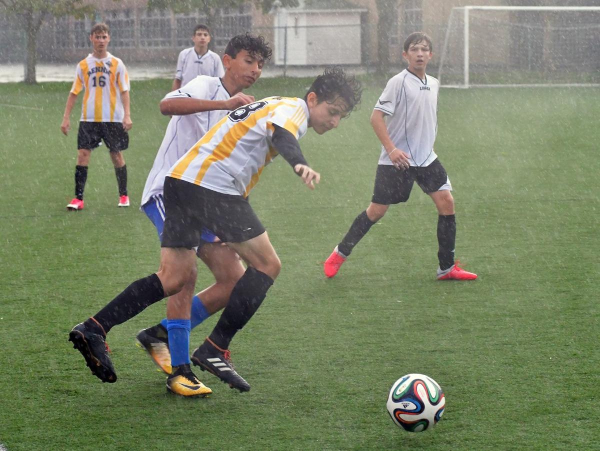 Lcchs Upsets Undefeated John Rennie In Rain Soaked Game Sports Thesuburban Com