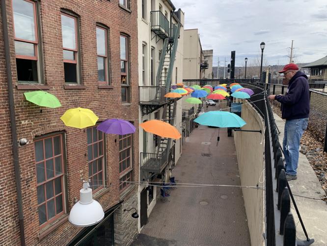 Umbrella policy: Colorful art display brightens, shades quirky Scranton street