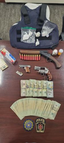 Two charged in seizure of guns, drugs from Olyphant home