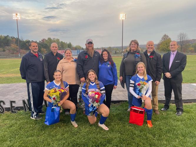 Carbondale’s Varsity Girls Soccer team held Senior-Parent Recognition Night on Oct. 17. Front row from left, Ashley Escott, Captain Audrey Cobb and Captain Madalyn Borders. Back row from left, Head Coach Thomas Mauro, David Escott, Heather Escott, Ray C...