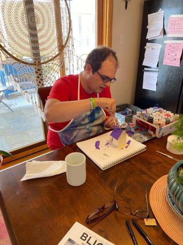 Tommy Hennigan working on a painting. The Dunmore artist has been painting since 2016.