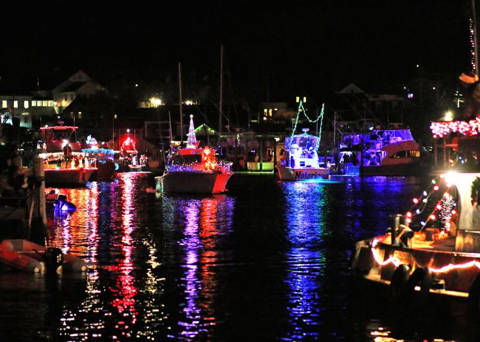 PHOTOS Boats light up the Mystic River for holiday parade Dailynews